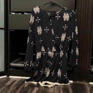 Navy and white romper. Long sleeve super cute and flattering